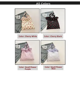 Vue détaillée des sacs cabas en mousseline à motifs floraux et cerises avec volants