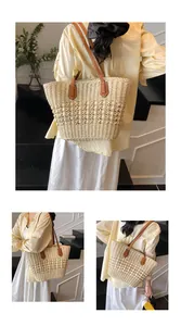 Close-up of diamond pattern straw weaving and brown leather handle on summer tote bag