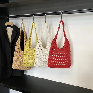Handmade crochet hollow shoulder bags in four trendy colors for summer beach and daily use