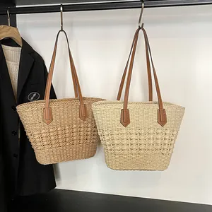 Straw shoulder tote bag for summer beach vacation in khaki and off-white woven design