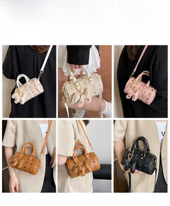 Detailed views of bear print Boston bags in four colors showing hand-carry and crossbody styles