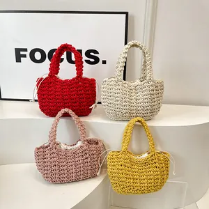Eleganti borse tote in maglia rossa, panna, rosa e gialla con trama a nido d'ape