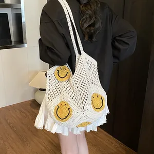Fashionable white crochet beach tote bag with yellow smiley patches for summer vacations