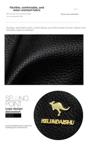 Detail aus weichem schwarzem Lychee-Leder mit glänzendem goldenem Känguru-Logo-Beschlag