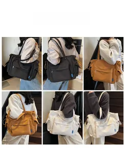 Detailed views of multi-pocket canvas crossbody bags in black, brown and beige colors