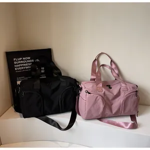 Detail of nylon travel bags with multi-pocket design and adjustable shoulder straps
