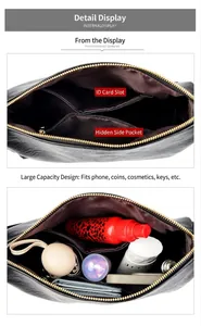 Detail view of black Boston bag interior with multiple pockets and large storage space