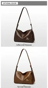 Detail view of coffee and yellow brown Boston bags with kangaroo logo and fine leather texture