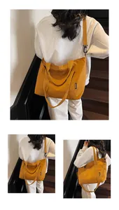 Détail du grand sac cabas en toile jaune avec bandoulière réglable et larges poignées