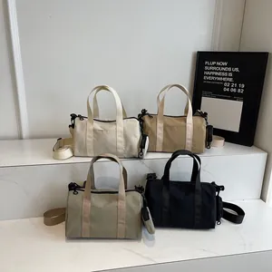 Sac cylindrique minimaliste en toile pour femme avec petit porte-monnaie en quatre tons
