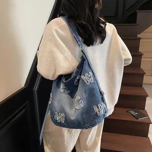 Street style large denim tote bag with letter patches and distressed details