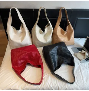 Minimalist woven hobo tote bags displayed in white, beige, tan, red, and black colors
