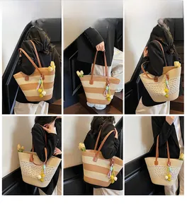 Detail of striped and hollow straw tote bags with leather straps and colorful tassels
