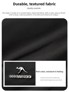 Gros plan sur le cuir de vachette noir de qualité et le logo métallique du sac oreiller