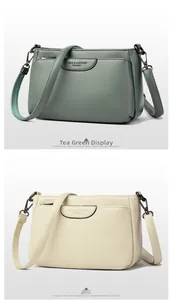 Detailed comparison of lychee leather crossbody bags in tea green and creamy white colors