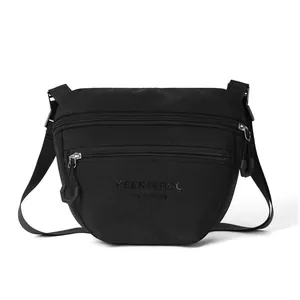 Lightweight black nylon crossbody bag for women with triple zipper compartments