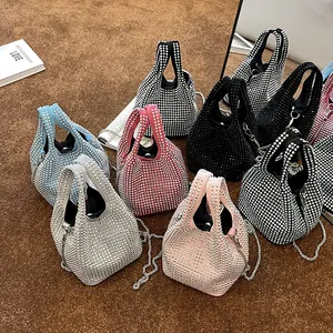 Sparkling rhinestone mini bucket bags in assorted colors with sleek metal chain straps