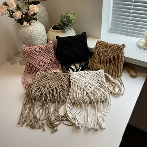 Handmade woven cotton tassel bags in pink black khaki grey and cream for beach holidays