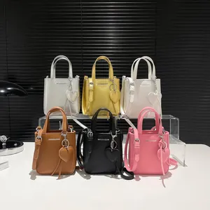 Chic solid color crossbody bucket bags set in six metallic and matte faux leather finishes