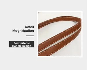 Detail magnification showing comfortable brown leather handle with white contrast stitching