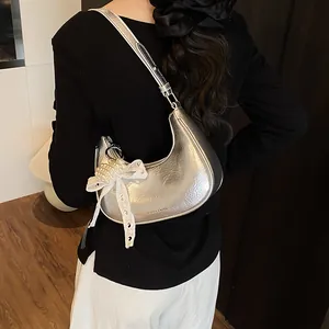 Silver metallic hobo bag for women with pearl lace pendant and adjustable strap
