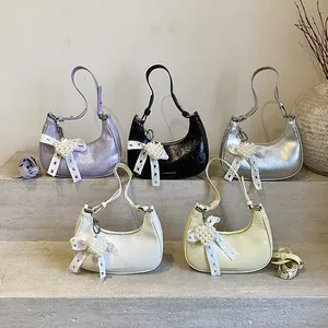 Minimalist pleated crescent bags in five colors with pearl heart and lace bow charms