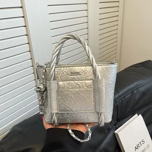 Silver wrinkled leather bucket bag with braided handle and silver metal chain strap