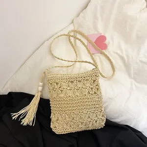 Bohemian Straw Woven Crossbody Bag For Women Hollow Flower Pattern Mini Phone Bag With Tassels Wood Beads Beach Vacation Bag