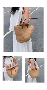 Détail du sac fourre-tout tissé avec anses en cuir marron et intérieur spacieux