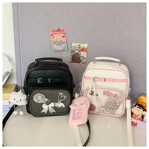 Detail of large Ita bag with transparent PVC window for badges and DIY accessories