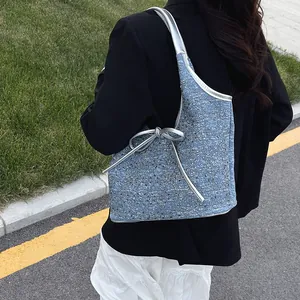 Τσάντα denim με ζακάρ σχέδιο Oblique, φιόγκο και ασημί δερμάτινη επένδυση για γυναίκες