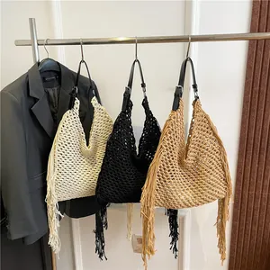 Handmade woven tote bag with fringe details and adjustable leather straps in three colors
