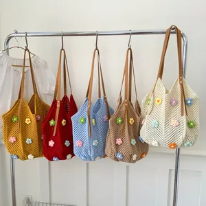 Handcrafted crochet floral tote bags in five vibrant colors with faux leather straps