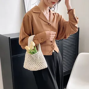 Elegant caramel satin long sleeve shirt with lapel collar and vintage buttons for women