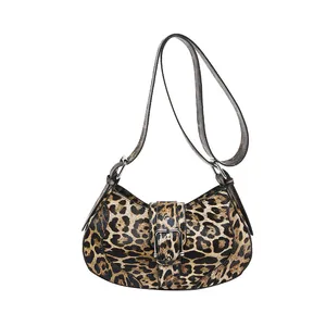 Vintage leopard print hobo shoulder bag with silver buckle and adjustable strap