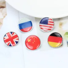 Detail showing round national flag lapel pins with zinc alloy base and epoxy finish