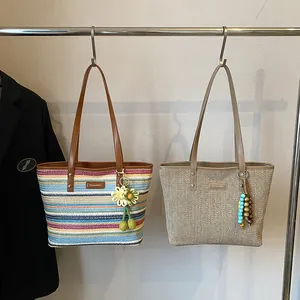 Rainbow striped and beige woven tote bags with leather handles for summer beach style