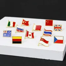 Detailed collection of 12 national flag enamel pins on minimalist geometric stands