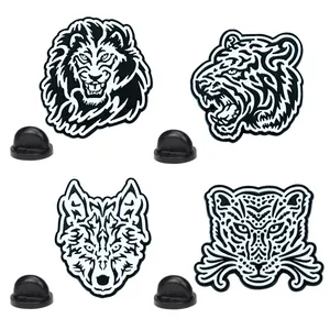 Geometric tiger and lion enamel brooch set with black and white tattoo style animal designs