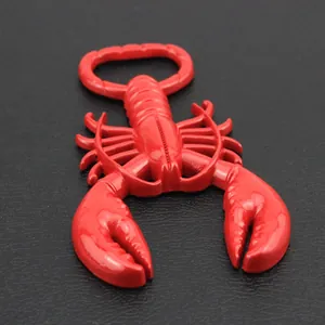 Macro shot of realistic red crawfish bottle opener on black textured surface