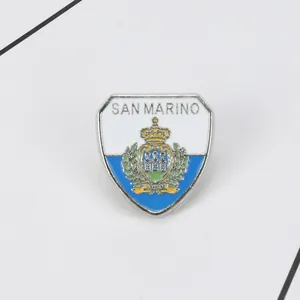 Detailed view of shield-shaped San Marino flag enamel pin made from high-quality zinc alloy