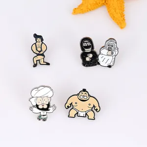 Set of four unique enamel pins featuring retro figures, cultural characters, and a sumo wrestler