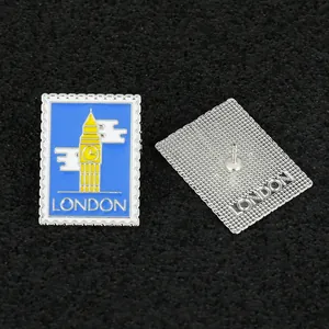 Detail view of London Big Ben stamp enamel pin with textured metallic back side