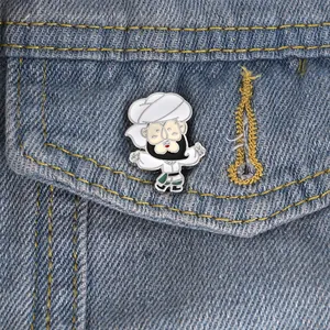 Cartoon enamel brooch featuring a bearded man in Arabic attire on a blue denim jacket