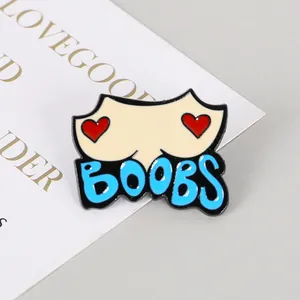 Macro detail of Picasso style enamel pin featuring artistic lettering on decorative card