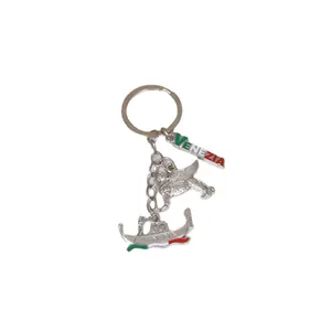 Polished silver metal Venice souvenir keychain with San Marco lion and gondola charms