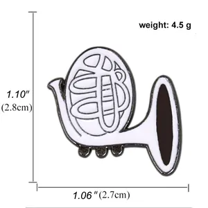 Detailed view of white enamel French horn brooch with 4.5g weight and size specifications
