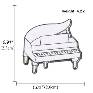 Macro detail of a white enamel piano brooch with silver alloy trim and music stand