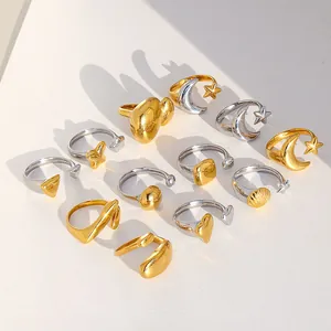 Minimalist gold and silver stainless steel rings with shell, star, and heart designs