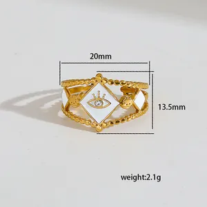 Detailed view of evil eye gold ring with 20mm width and 13.5mm height measurements
